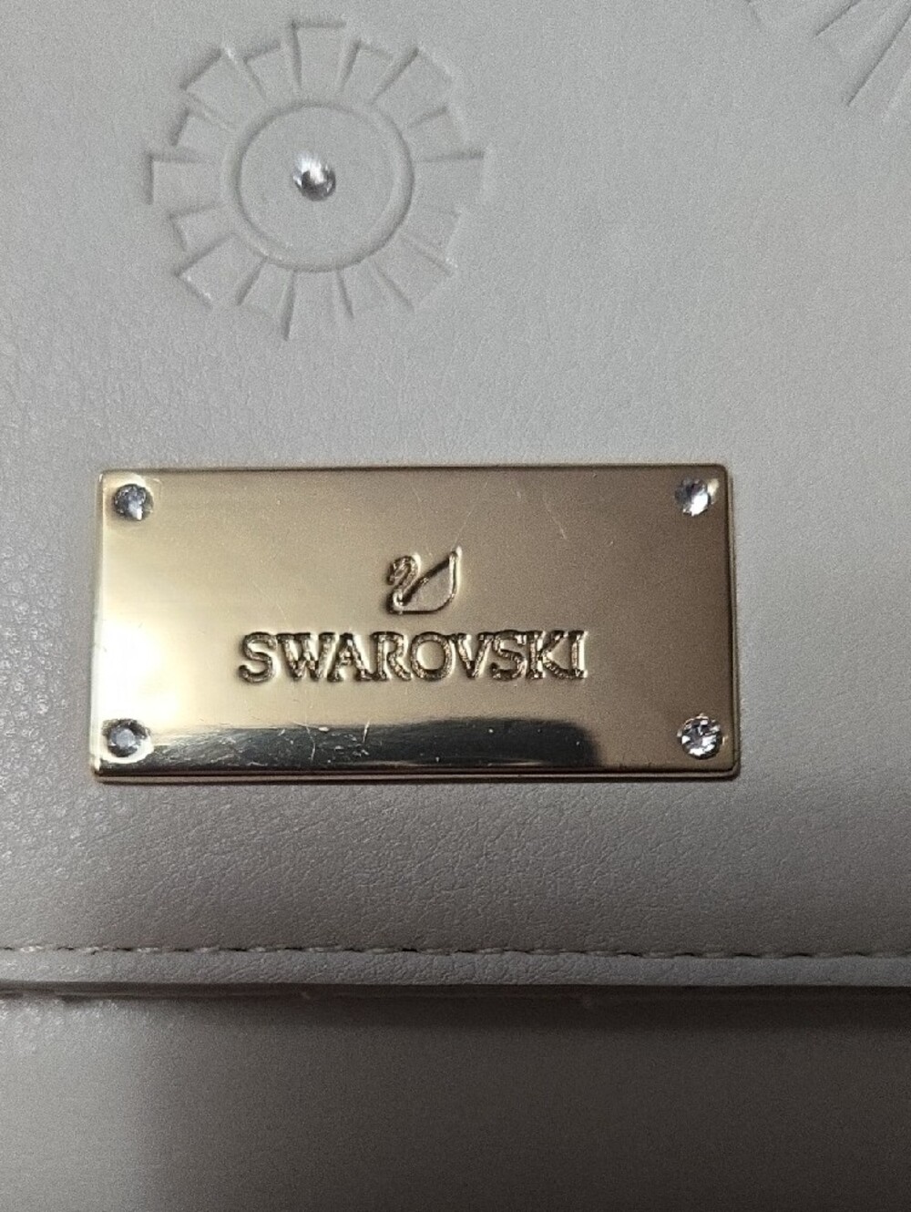 Swarovski Ivory/White Embossed Leather Wristlet Clutch with Gold Plaque - Picture 6 of 6